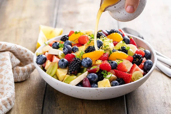 Fruit Salad Wooden Table Berries Citrus Zest Mint Honey Dressing — Stock Photo, Image