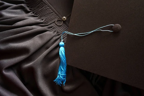 Black Graduation Cap university pace on graduation gown graduation concept