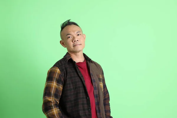 40S Adult Asian Man Plaid Shirt Standing Green Background — Stock Photo, Image