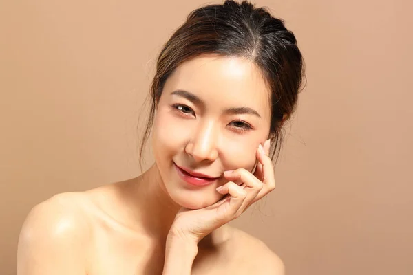 Beautiful Asian Woman Showing Skin Yellow Background — Stockfoto