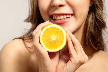 The beautiful  Asian woman showing skin with white background
