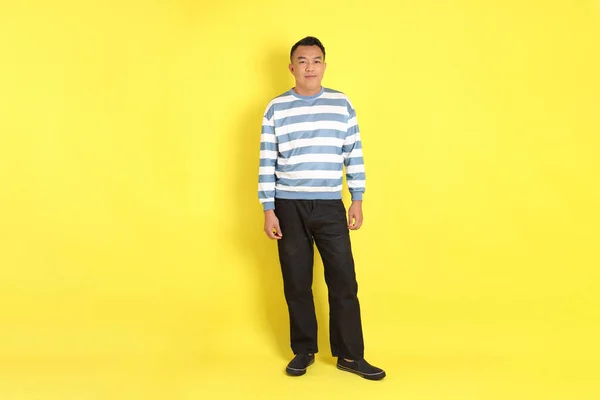 40S Adult Asian Man Standing Yellow Background — Stockfoto