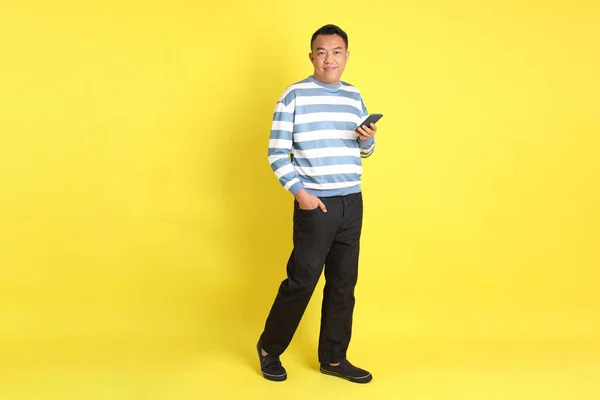 40S Adult Asian Man Standing Yellow Background — Stock fotografie