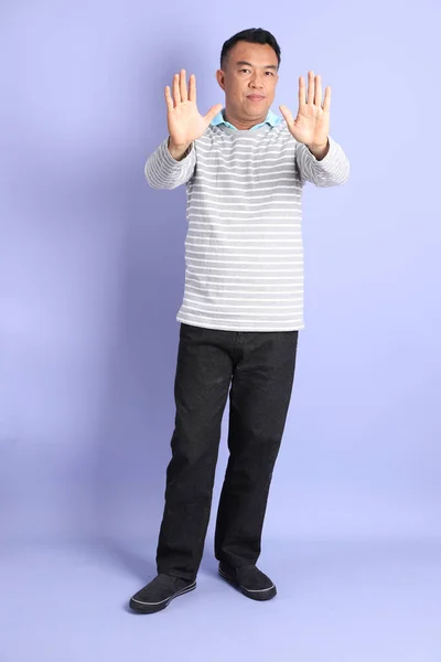 40S Adult Asian Man Standing Purple Background — 스톡 사진