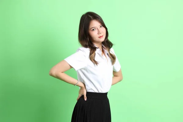 Young School Girl Uniform Standing Green Background — Stock Photo, Image