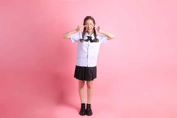 Chica Asiática Uniforme Estudiante Tailandés Pie Sobre Fondo Rosa —  Fotos de Stock