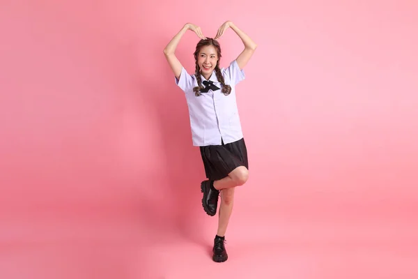 Chica Asiática Uniforme Estudiante Tailandés Pie Sobre Fondo Rosa —  Fotos de Stock