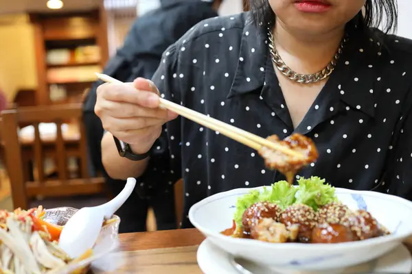 Asian Woman Eating Japanese Meatballs Restaurant — Stock Photo, Image