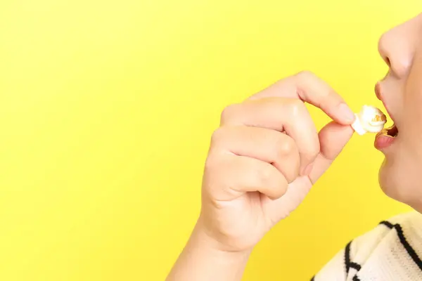 Asian Woman Eating Popcorn Hand Yellow Background — Stock Photo, Image
