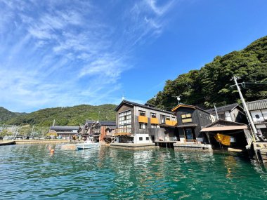 The view of Ine Funaya, the houses along the sea in Kyoto, Japan. clipart