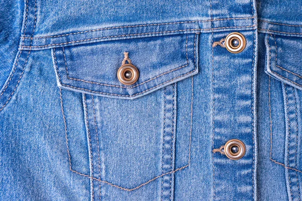 ポケット付きデニムジーンズのテクスチャの背景 装飾的な縫い目とボタンと青色の綿生地のテクスチャ ステッチのテクスチャジーンズの背景 繊維構造とファブリック構造 ファッション ショッピング — ストック写真