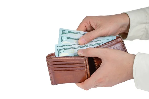 Stock image Man counting money. Allocation of money, economy concept, US dollar falling or rising. Man hands with dollar cash isolated on white background. Top view, flat lay. Business, finance, bank, currency