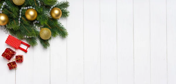 Christmas Tree Branch Decorated Golden Balls White Wooden Background Top — Stock Photo, Image