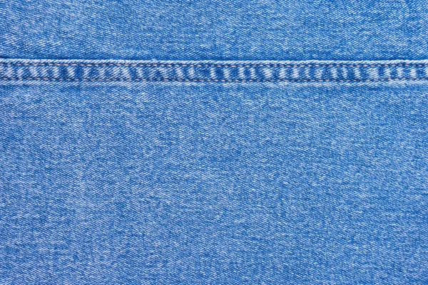 デニムジーンズの質感の背景 装飾的な縫い目と青色の綿生地のテクスチャ スティッチテクスチャジーンの背景 繊維と生地の構造 バナー ヘッダー — ストック写真