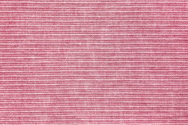 Arka plan olarak doğal keten dokusu. Kırmızı ve beyaz çizgili pamuk kumaş, desen yakın, üst vies düz yatıyordu. Arkaplan, duvar kağıdı. Giysiler, perdeler ve döşemeler için malzeme