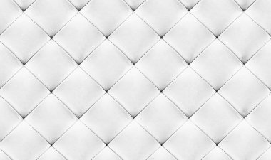 White natual leather background for the wall in the room. Interior design, headboards made of artificial leather, leatherette , furniture upholstery. Classic checkered pattern for furniture, headboard