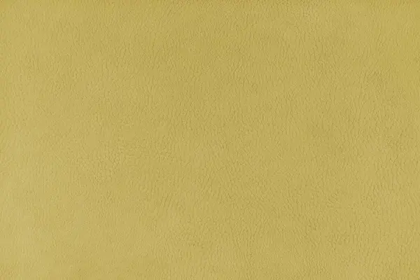 革の表面のような黄色のベロア生地のテクスチャの背景 布の質感は 内装家具のテキスタイル素材 デザインインテリア 壁の装飾 壁紙のクローズアップ — ストック写真