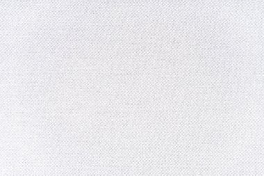 Texture of natural fabric or cloth. Fabric texture diagonal weave of natural cotton or linen textile material. White canvas background. Decorative fabric for curtain, furniture, walls, clothes