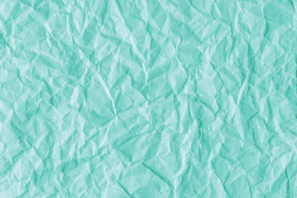 Recycelte Zerknüllte Türkisfarbene Papiertextur Hintergrund Faltiger Und Faltiger Abstrakter Hintergrund — Stockfoto