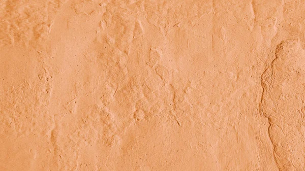 stock image Vintage, old stucco plaster wall background, close up grunge texture of orange painted cement, concrete wall texture. Wallpaper, backdrop, architecture design element