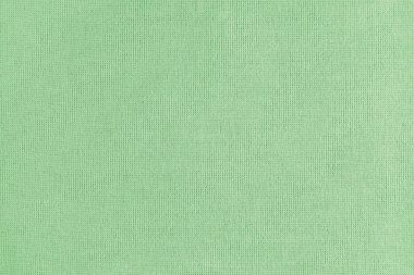 Yeşil pamuk kumaşın dokusu. Tekstil yapısı, kumaş yüzeyi, keten kumaş dokusu yakın plan, duvar kağıdı..