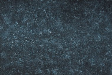 Boyanmış tuvalin kirli arka plan dokusu. Soyut zarif duvar kağıdı, klasik siyah-mavi beton yüzey, stüdyo arkaplanı.