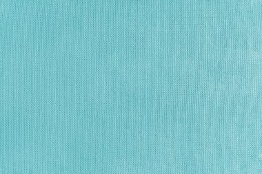 Cyan kadife kumaşın dokusu. Tekstil yapısı, kumaş yüzeyi, Jacquard malzemesinin yakın çekim dokusu. Döşemeler, perdeler, arka plan, duvar kağıtları..