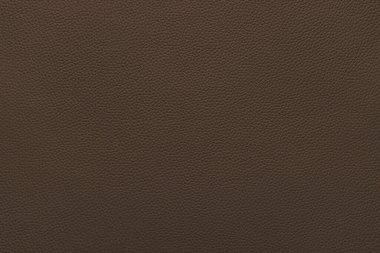 Hakiki kahverengi deri, çevre dostu deri dokusu arka planda. Döşeme ve iç dizayn için malzeme, spor eşyaları ve giysiler. Duvar kağıdı, afiş, arkaplan.