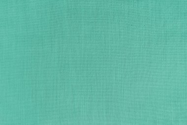 Turkuaz keten kumaşın dokusu. Tekstil yapısı, kumaş yüzeyi, doğal pamuktan dokuma yakın plan, duvar kağıdı..
