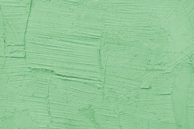 Eski, alçı kaplama yüzey arka plan, yeşil boyanmış çimento grunge dokusu, beton duvar dokusu. Duvar kağıdı, arkaplan, mimari tasarım ögesi