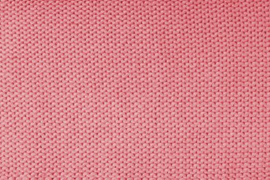 Yapışkan iplikten örülmüş yün kumaşın, kırmızı yün örgü dokusunun arka planını kapat. Kazak, kazak örgü forma arka planı. Kumaş soyut arkaplan, duvar kağıdı