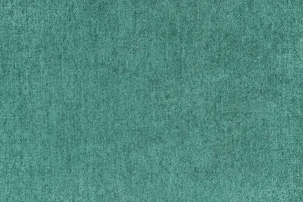 Kadife jakuzi turkuaz kumaşın dokusu. Döşeme dokusu kumaşı, kadife mobilya tekstil malzemesi, iç tasarım, dekor. Pürüzlü kumaş dokusu Kapat, arkaplan, duvar kağıdı.