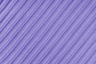 Jersey tekstil arka planı, menekşe köşeli örgü kumaş. Yünlü örgü, kazak, kazak, kazak yüzey dokusu, tekstil yapısı, kumaş yüzey, örgü kumaş dokusu.