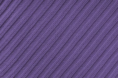Jersey tekstil arka planı, mor köşegen örgülü kumaş. Yünlü örgü, kazak, kazak, kazak yüzey dokusu, tekstil yapısı, kumaş yüzey, örgü kumaş dokusu.