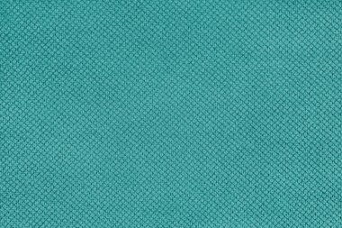 Düz turkuaz kadife döşeme kumaşı, ince elmas desenli jakuzi. Yaklaş, makro kumaş tekstil yüzeyi. Duvar kağıdı, kopyalama alanı olan arkaplan