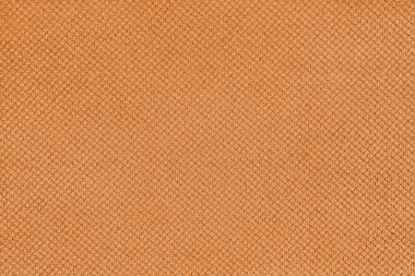 Sade turuncu kadife döşeme kumaşı, parlak elmas desenli jakuzi. Yaklaş, makro kumaş tekstil yüzeyi. Duvar kağıdı, kopyalama alanı olan arkaplan