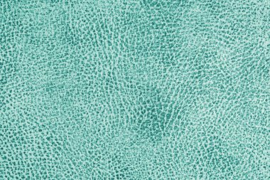 Soyut pejmürde desenli Jacquard turkuaz kumaş, yakın çekim, makro. Döşeme, perde dekoratif kumaş yapı, ev dekorasyonu için tuval. Arkaplan, arkaplan, duvar kağıdı.