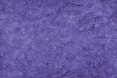 Pofuduk mor döşeme kumaşı ya da kumaş dokusu. Yapay kürk kumaşının kumaş dokusu. Tuvalin arka planı. Perde, mobilya, duvar ve kıyafetler için dekoratif kumaş.