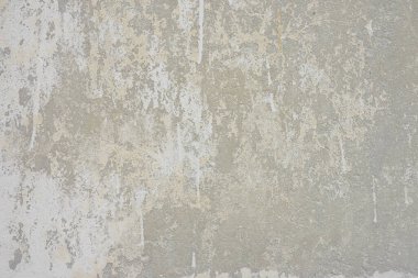 Boyanmış gri, kirli beton arka plan dokusu. Soyut duvar kâğıdı, eski püskü, sıkıntılı taş duvar boya izleri, klasik sıva yüzeyi, arka plan...