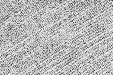 Jacquard köşegen örgü dokusu döşeme beyazı. Tekstil arka planı, mobilya tekstil malzemesi, duvar kağıdı, fon. Kumaş yapısı kapat, makro.