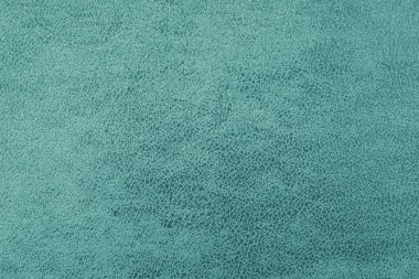 Jacquard turkuaz kumaşının kumaş yapısı, soyut, pejmürde, güneş gözlüklü, makro. Döşeme, dekoratif kumaş yapı, ev dekorasyonu için tuval. Arkaplan, arkaplan, duvar kağıdı.