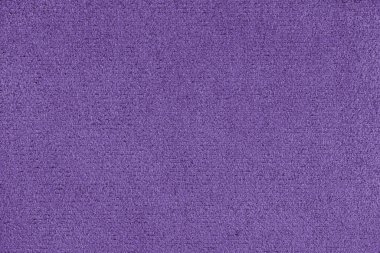 Düz mor renkli mikrofiber detay dokusu. Süet deri döşeme, kapanış, makro. Duvar kağıdı, arkaplan, tekstil arkaplanı.