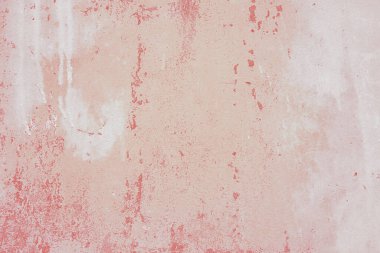 Textured plaster wall surface with peeling paint in various shades of red and white color. Aged, weathered background. Wallpaper, backdrop, design element clipart