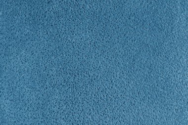 Kabartmalı benekli mavi süet deri desenli. Tüylü kumaş yüzey, dekoratif döşeme, ev dekorasyonu ve giysi. Duvar kağıdı, arkaplan, arkaplan.