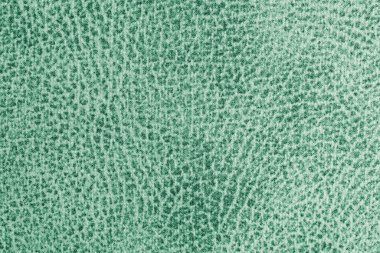 Soyut, pejmürde lekeli yeşil kumaş. Yaklaş, makro doku. Döşeme, perde dekoratif kumaş yapı, ev dekorasyonu için tuval. Arkaplan, arkaplan, duvar kağıdı.