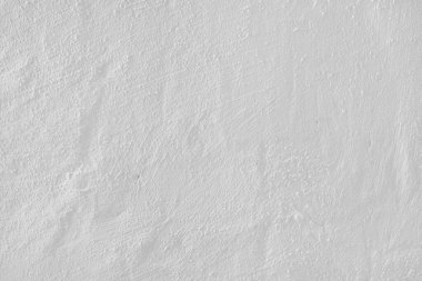 Stucco alçı yüzey, fırça darbesi arka plan, yakın çekim, beyaz boyanmış çimento makro doku, beton duvar dokusu. Duvar kağıdı, arkaplan, mimari tasarım ögesi
