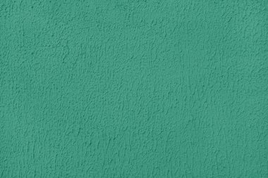 Eski alçı yüzey, doku alçı kaplama, yeşil boyanmış çimento grunge dokusunu kapat, beton duvar dokusu. Duvar kağıdı, arkaplan, mimari tasarım ögesi