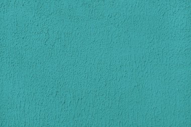 Eski alçı yüzey, doku alçı kaplama, turkuaz boyanmış çimento, beton duvar dokusu. Duvar kağıdı, arkaplan, mimari tasarım ögesi