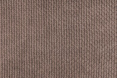 Kadife desenli kahverengi kumaş kabarık örgü yakın, makro örülmüş kalın. Tekstil arka planı, mobilya tekstil malzemesi, duvar kağıdı, fon. Kumaş yapısı kapat, makro.