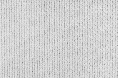 Kadife desenli beyaz kumaş kabarık örgü yakın, makro dokuma kabarık. Tekstil arka planı, mobilya tekstil malzemesi, duvar kağıdı, fon. Kumaş yapısı kapat, makro.